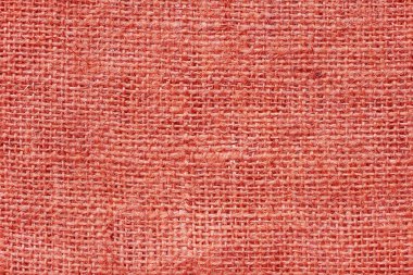 Kırmızı çuval bezi, güzel bez kumaş dokusu ve güzel çuval bezi rengi ve güzel çuval bezi rengi arkaplan olarak güzel kırmızı kumaş bezi dokusu ile retro tarzı.