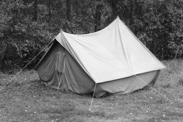 Old canvas tent in tourist camp in summer