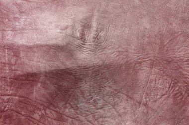 Beautiful red background with leather texture with red veins of red leather background as sample of red background from natural leather or sample of texture of leather for beautiful natural background
