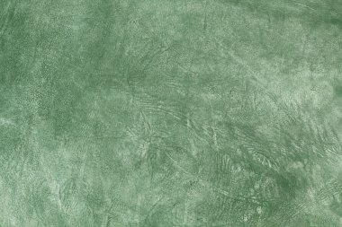 Beautiful green background with leather texture with green veins of green leather background as sample of green background from natural leather or texture of leather for beautiful background