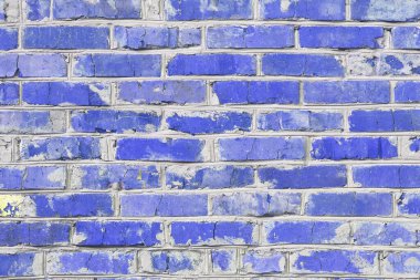 Mavi tuğlalardan yapılmış olağandışı mavi tuğlalar ve soyut mavi arkaplan için kırık mavi tuğlalar olan tuğla duvar.