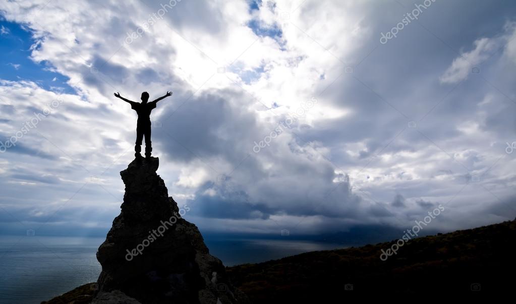 Man on the top of a rock