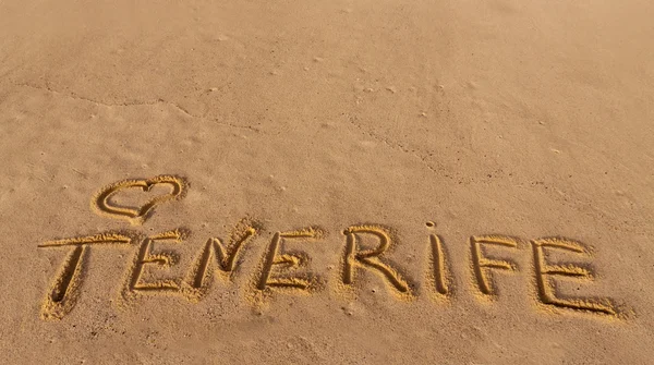 浜の砂で書かれた単語テネリフェ島 — ストック写真