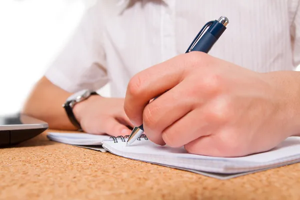 Close up of student hand writing — Stock Photo, Image