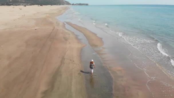 Aerial drone top down view of woman walking alone the beach. Patara Turkey — Stock Video