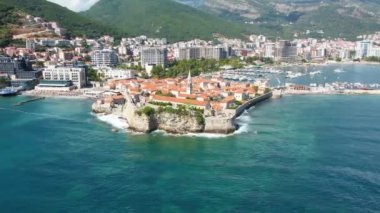 Aerial view of Budva, old and modern city on Adriatic Sea coast. Center of Montenegrin tourism and popular sea resort.