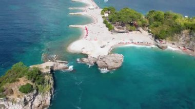 Sveti Nikola Saint Nicholas Island from drone in blue adriatic sea, Budva tourist resort, Montenegro