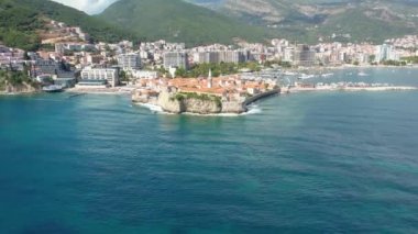 Aerial view of Budva, old and modern city on Adriatic Sea coast. Center of Montenegrin tourism and popular sea resort.