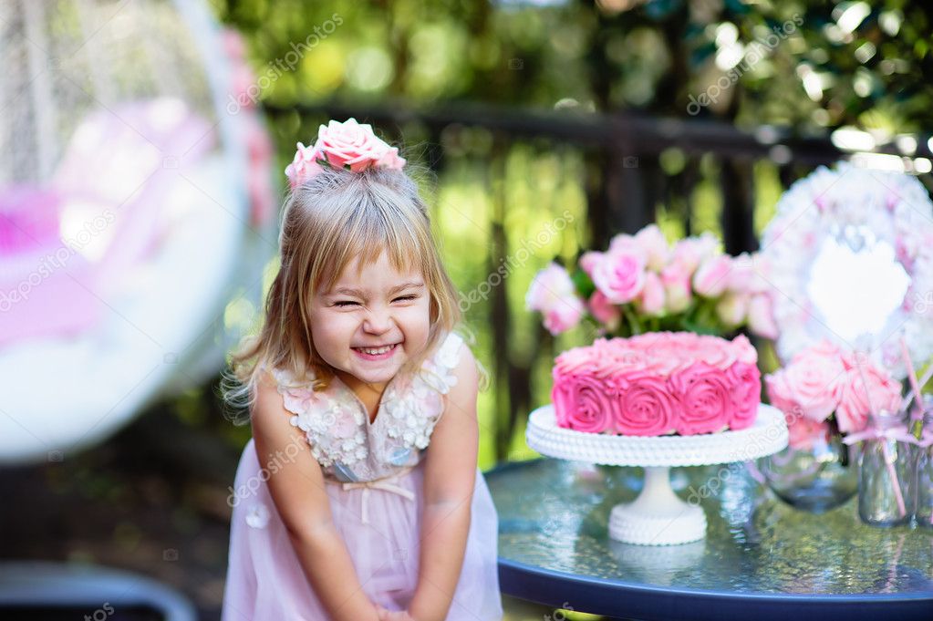 Little girl celebrate Happy Birthday Party with rose outdoor