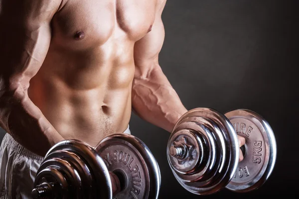 Man lifting weights — Stock Photo, Image