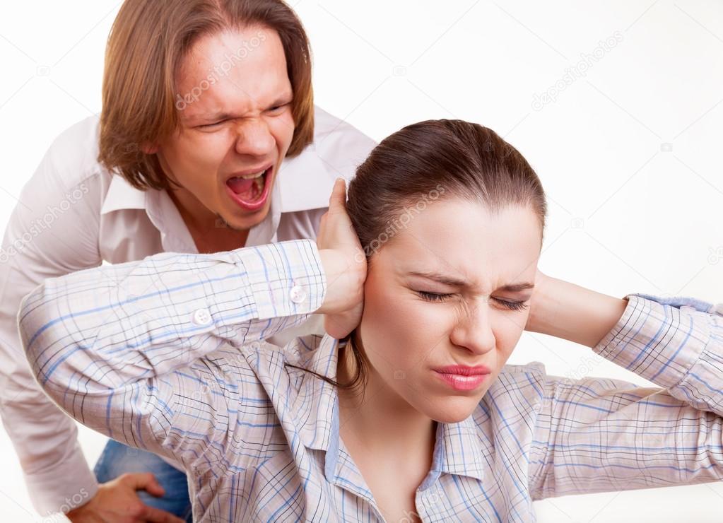 Man shouts at young woman