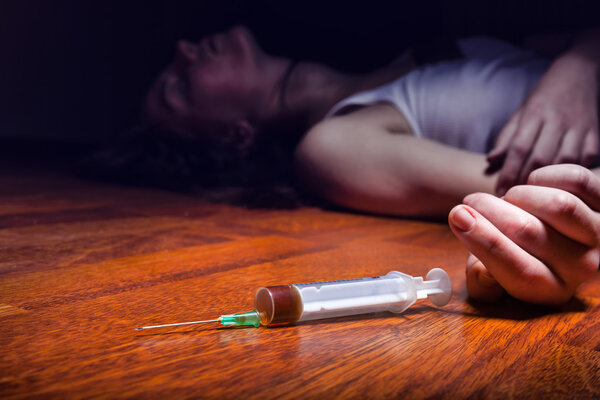 Young woman with drug