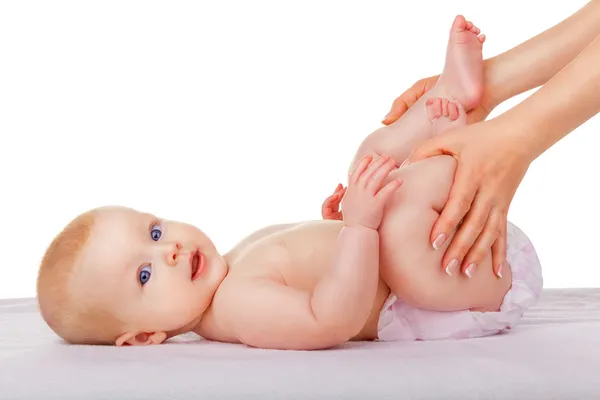 Mother massaging kid tummy — Stock Photo, Image