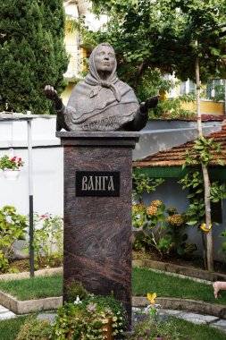 Petrich, Bulgaria - September, 29, 2021: a monument to the Bulgarian soothsayer Vanga in the courtyard of her house-museum