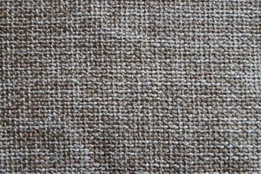 Gray canvas fabric for natural textile background close-up