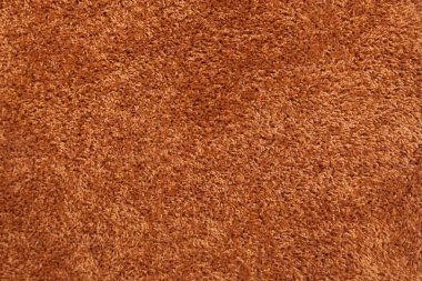 Tekstil arka planı için terracotta pelüş dokusu.