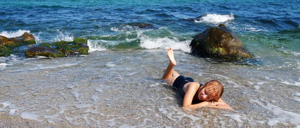 Teenage Girl Black Bathing Suit Sunbathing Shore Lying Water — Stockfoto