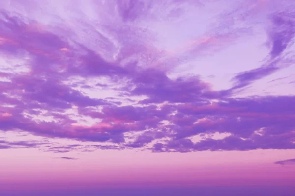 purple sky panorama with clouds for atmospheric background.