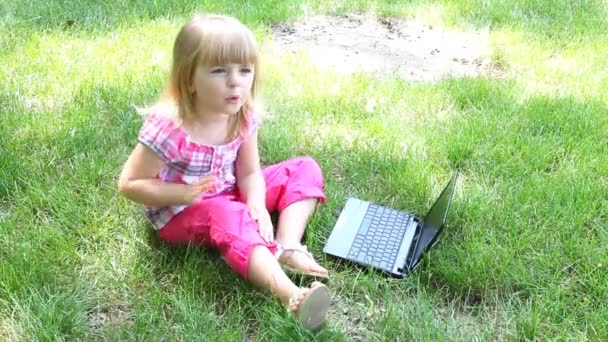 Little girl with laptop — Stock Video