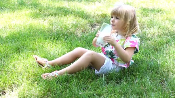 Little girl drinking milk — Stock Video