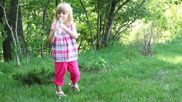 Little girl drinking water — Stock Video