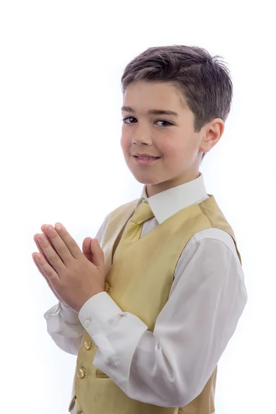 Jeune garçon priant dans sa première communion — Photo