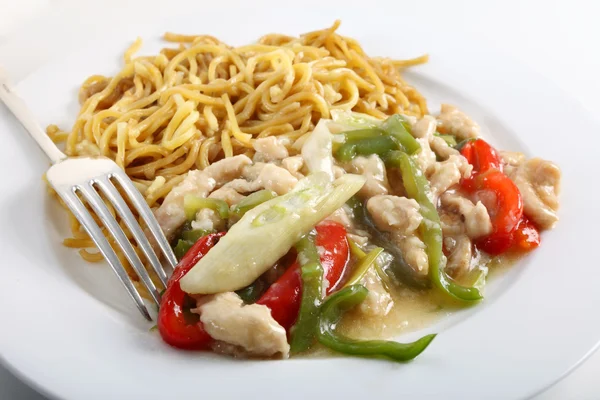 Chicken noodles and fork — Stock Photo, Image