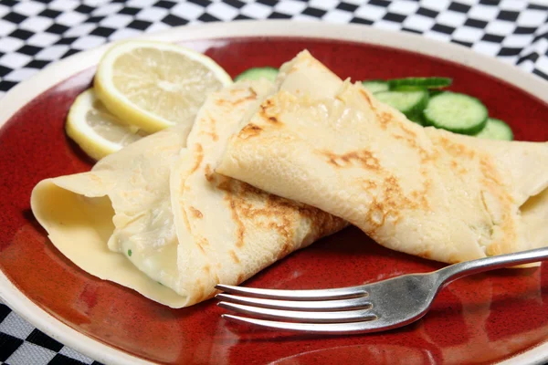 Crepes with a fork — Stock Photo, Image