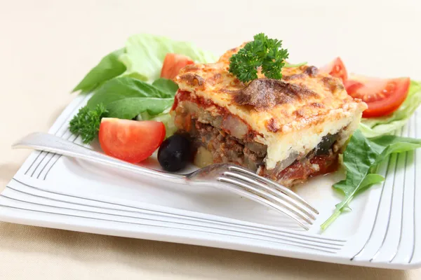 Moussaka och gaffel — Stockfoto