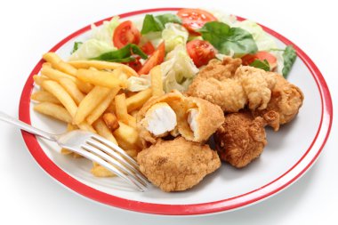Fish nuggets fries, salad and fork clipart