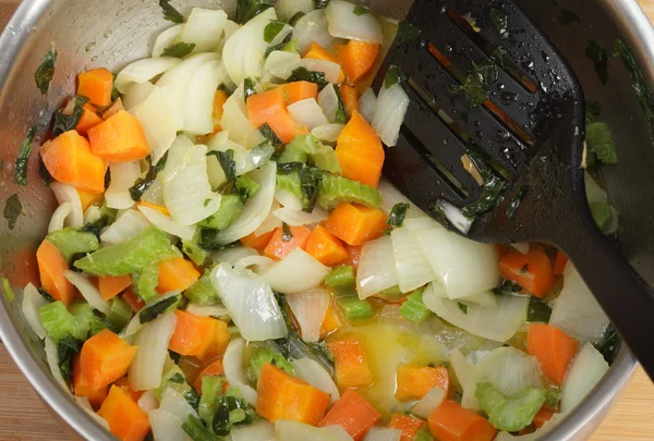 Frying onion celery and carrot — Stock Photo, Image