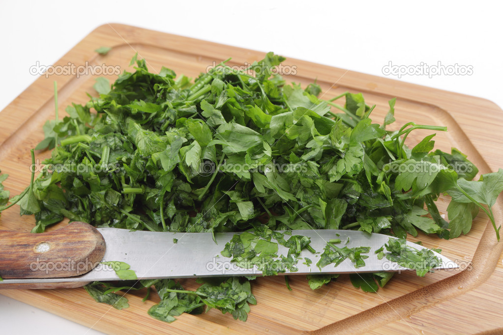 Chopped flat leaf parsley side view Stock Photo by ©Paul_Cowan 18914945