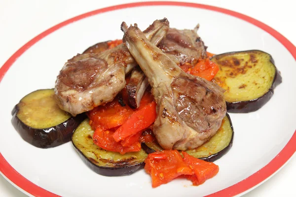 Grilled lamb chops on salsa — Stock Photo, Image