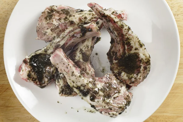 Marinading lamb chops from above — Stock Photo, Image