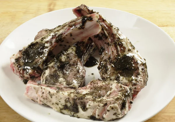 Lamb chops coated in marinade — Stock Photo, Image