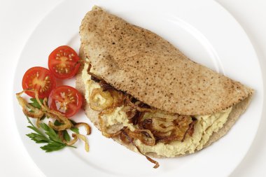 sándwich de humus de arriba
