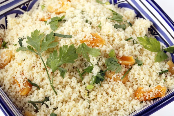 Couscous with dried apricots and parsley — Stock Photo, Image