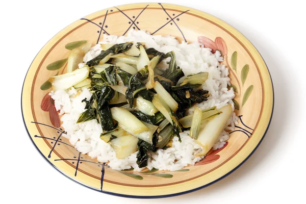 Sauterade bok choi på en bädd av jasmin ris — Stockfoto