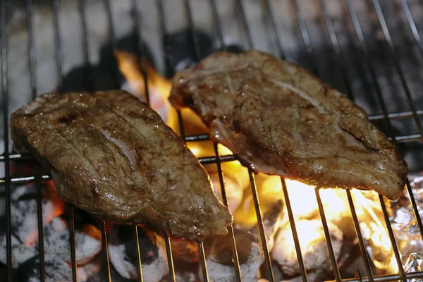 Angus steaks on a barbecue — Stock Photo, Image