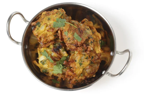 Onion bhajis in a kadai top view — Stock Photo, Image