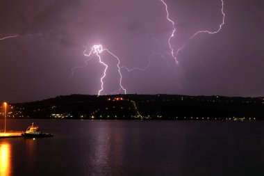 Lightning strike on Akrotiri clipart