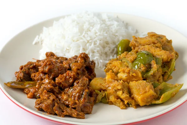 Curry de carne con patata y arroz —  Fotos de Stock