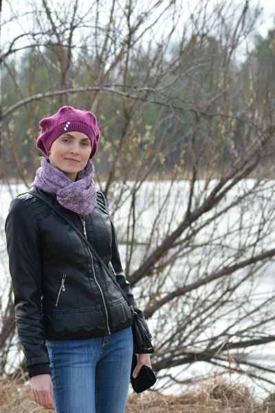 Woman in pink beret and black leather jacket — Stock Photo, Image