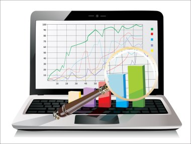 bazı 3d grafikler ile bir büyüteç elektronik tablo üzerinde gösterilen laptop