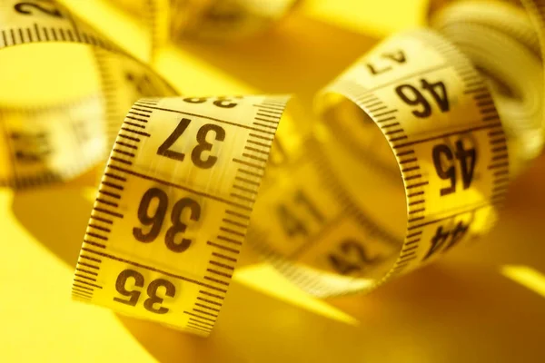 Yellow Measuring Tape Sunny Table Closeup — Stock Photo, Image