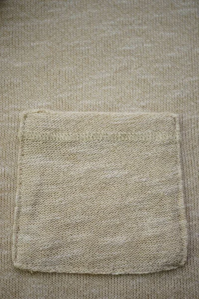Beige Sweater Pocket Knitted Cream Background — Zdjęcie stockowe