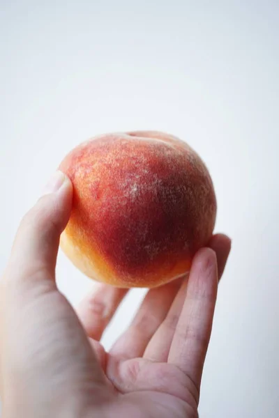 Ripe Peach Fruit Female Hand White Background — Stockfoto