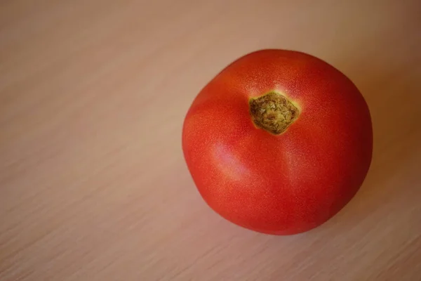 Ripe Pink Tomato Pale Wooden Table — Stock Fotó