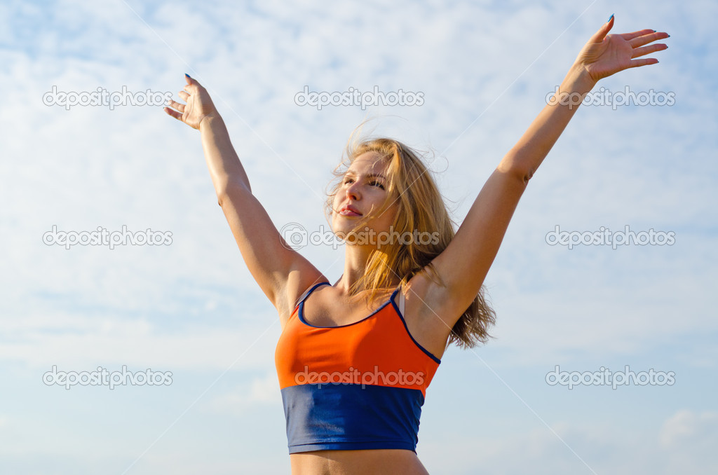Woman rejoicing in the sunshine