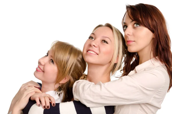 Tre glada unga kvinnor poserar tillsammans — Stockfoto